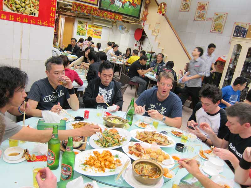 Van de kamp in eating with crew in hong kong